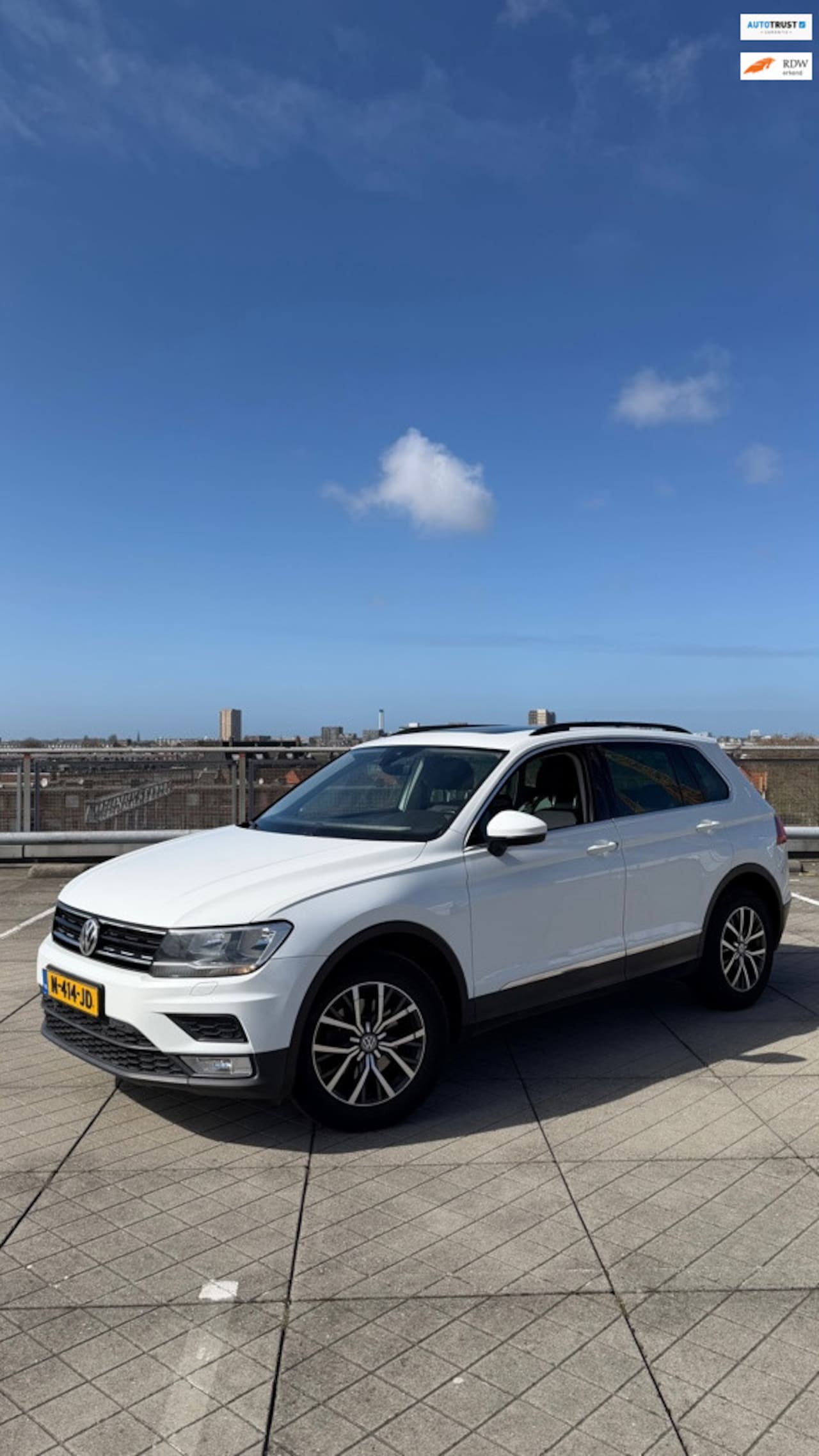 Volkswagen Tiguan - 1.4 TSI Connected Series Pano/Elek. koffer/Wit - AutoWereld.nl