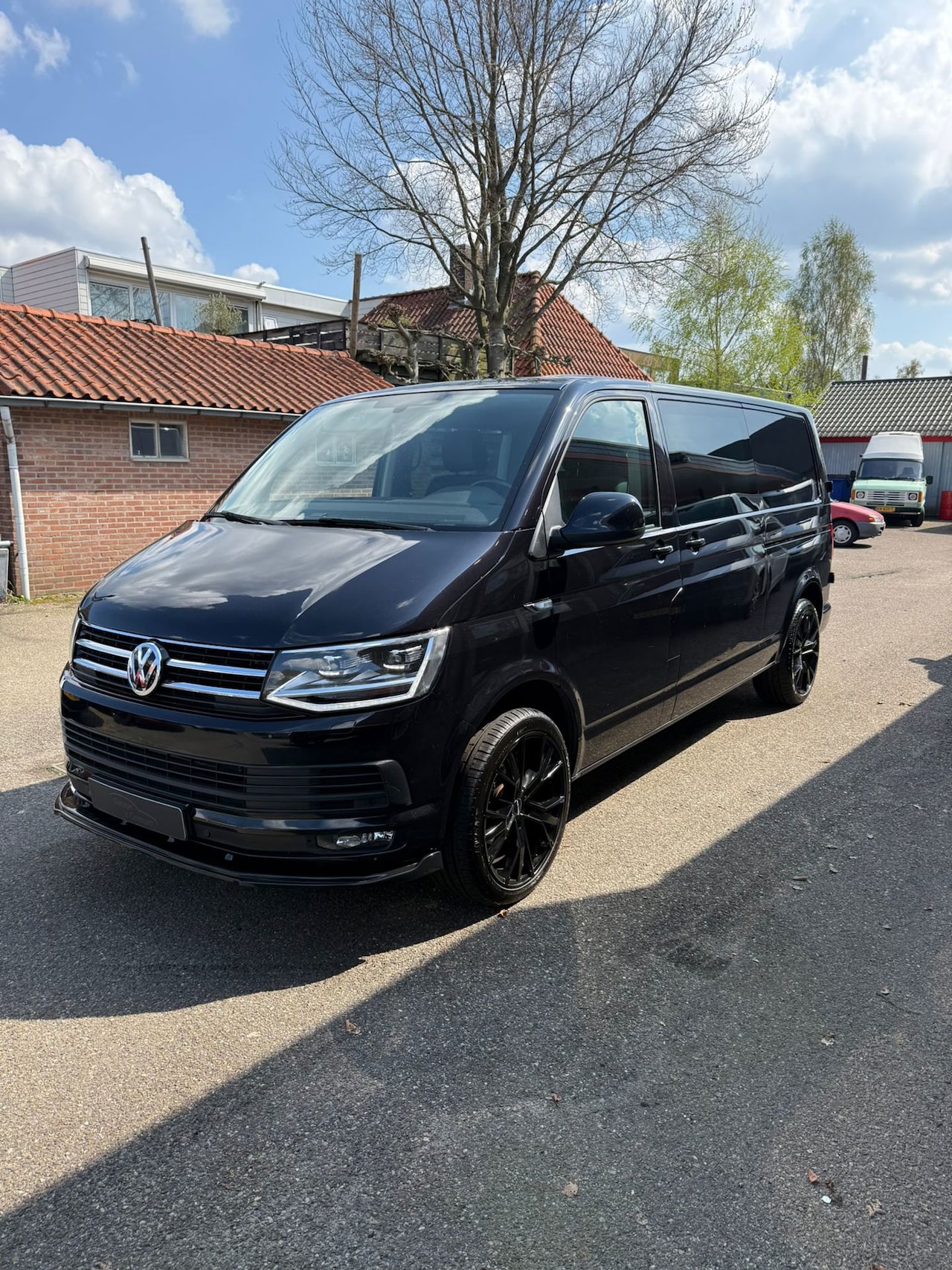 Volkswagen Transporter Caravelle - 2.0 TDI LANG DC|150 PK|DSG|LED|LEDEREN BEKLEDING|2x SCHUIFDEUR - AutoWereld.nl