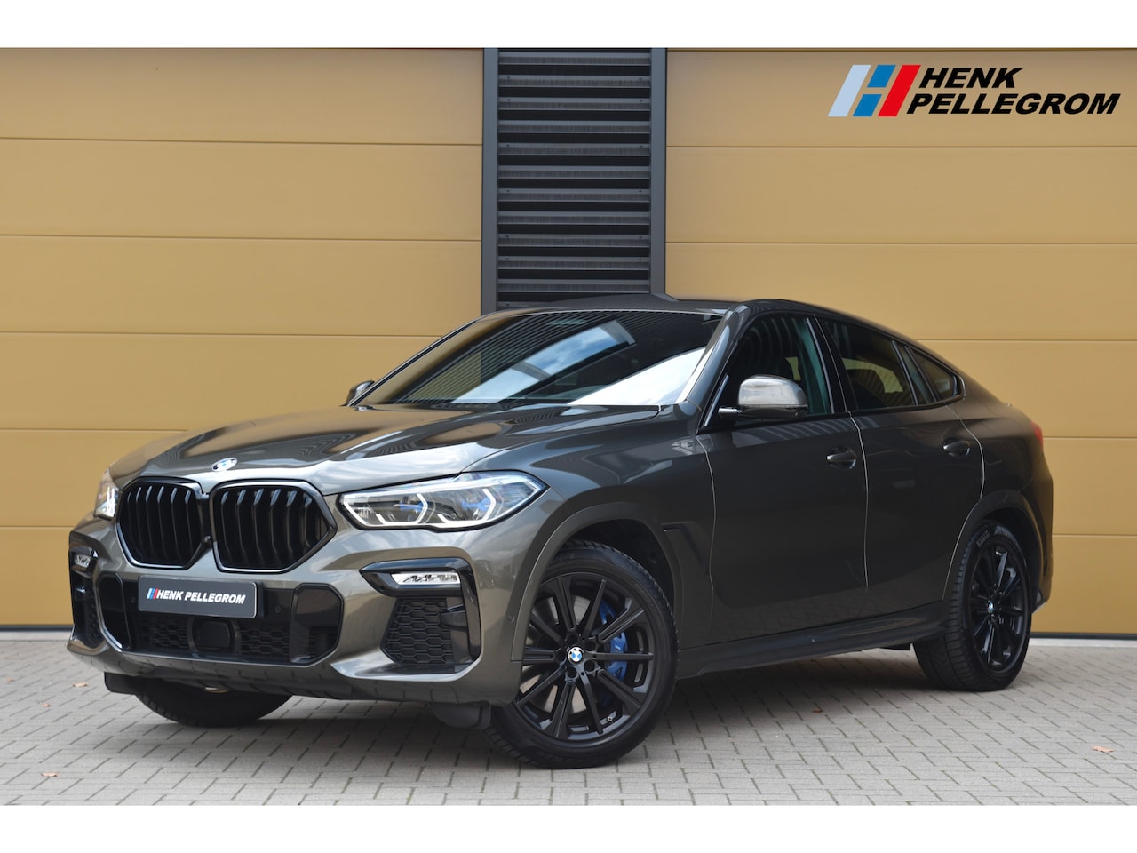 BMW X6 - xDrive40i High Executive * M-Sport  * Trekhaak * Head-up * Adaptief Cruise control * - AutoWereld.nl