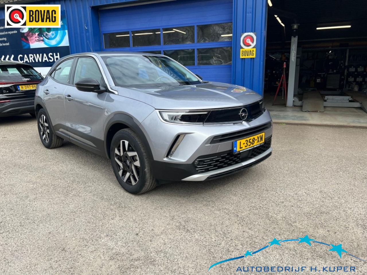 Opel Mokka-e - El. 50-kWh 11kw bl. | Cruise | Camera | Navi | Carplay/Android A - AutoWereld.nl