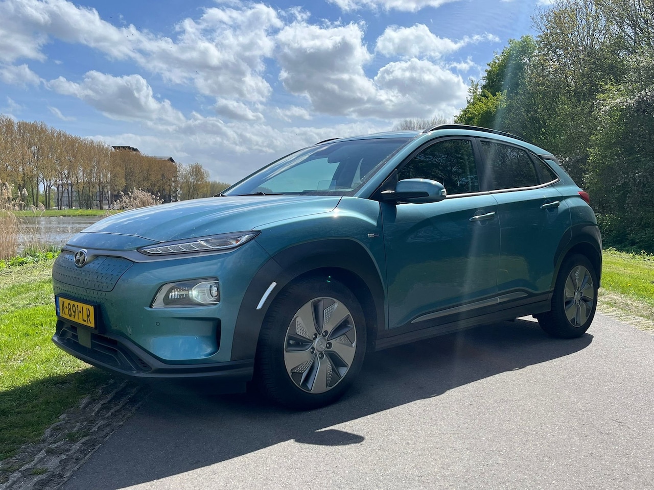 Hyundai Kona Electric - EV Premium 64 kWh 204pk | Adaptive Cruise controle | Head-up Display | Leder | Stoelventil - AutoWereld.nl