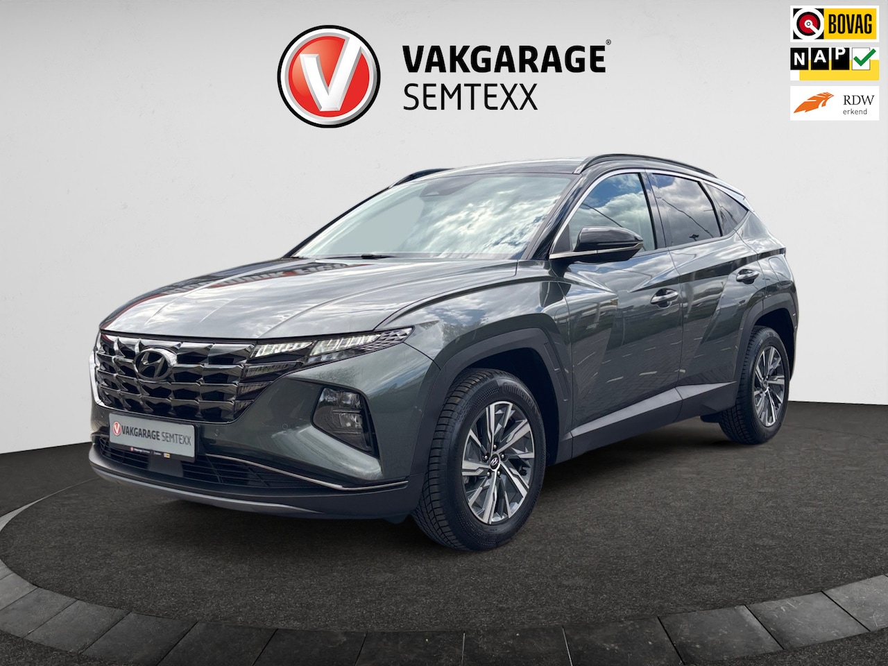 Hyundai Tucson - 1.6 T-GDI HEV Comfort Smart | Automaat | Clima | Camera | Cruise | 1ste Eige. | Navi | PDC - AutoWereld.nl