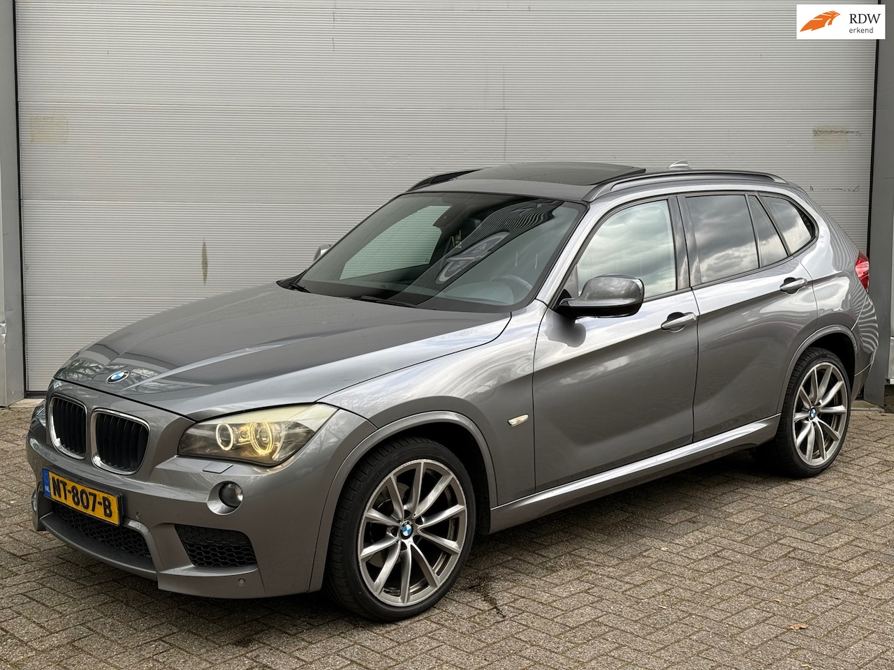 BMW X1 - SDrive18d Business M Sport l Pano l Xenon l Alcantara l Camera l NWE Motor+Koppeling l - AutoWereld.nl