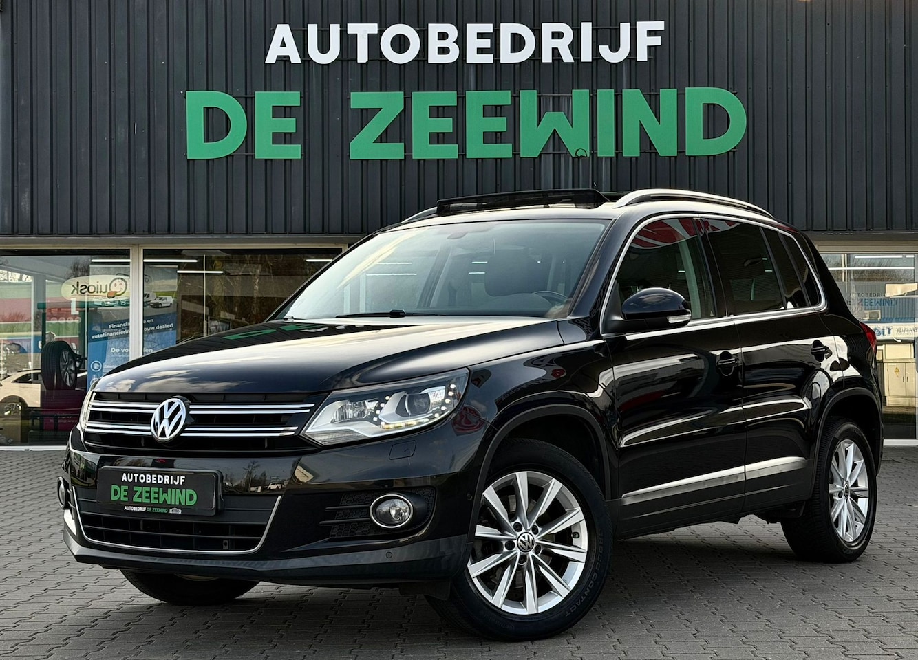Volkswagen Tiguan - 1.4 TSI Sport&Style|Pano|led|Ler|Rijklaar - AutoWereld.nl