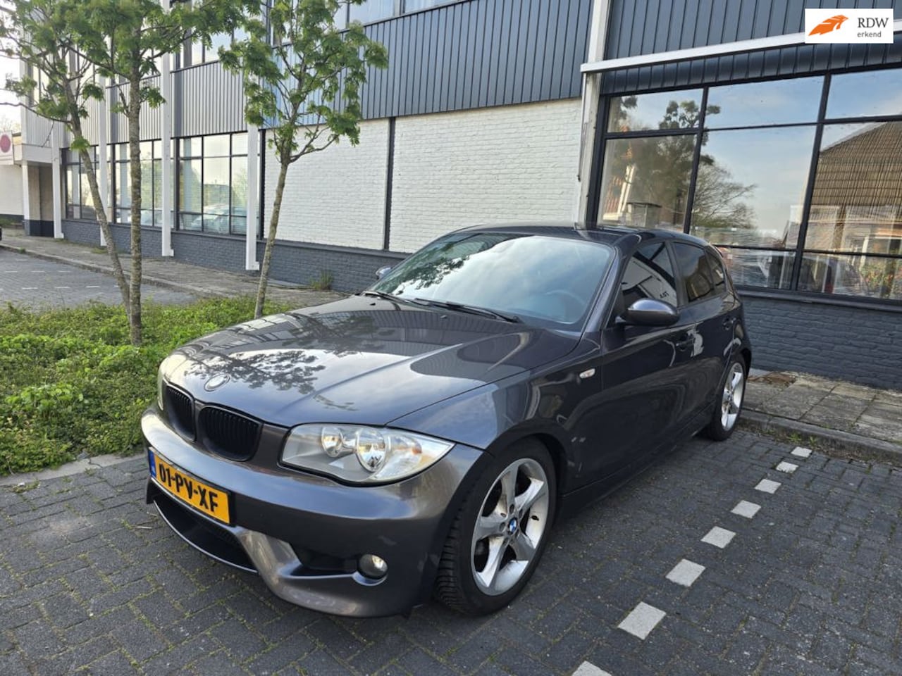 BMW 1-serie - 118d High Executive M Pakket - AutoWereld.nl