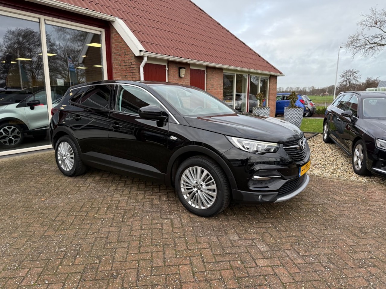 Opel Grandland X - 1.2 TURBO INNOVATION TREKHAAK/PDC/CRUISE/ENZ. - AutoWereld.nl