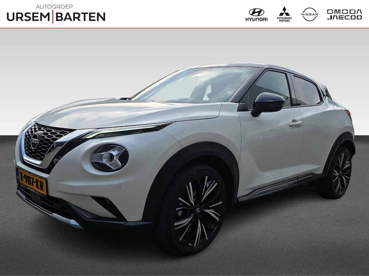 Nissan Juke - 1.0 DIG-T N-Design | Half leder stof interieur | 360 graden camera | Navigatie | Adaptive - AutoWereld.nl