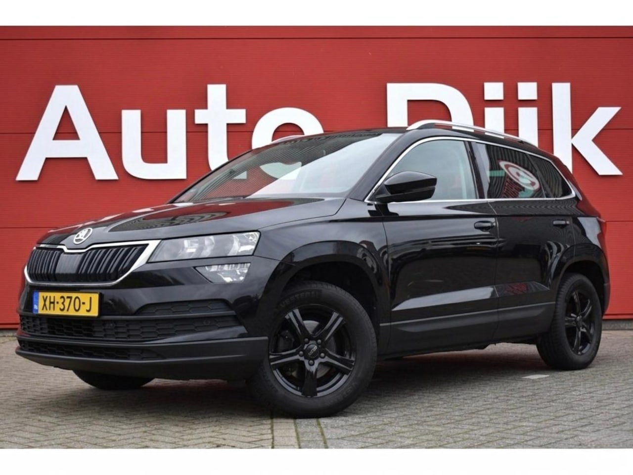 Skoda Karoq - 1.0 TSI Clever Edition Carplay | Trekhaak | Navi | Clima | Cruise | DAB | PDC V+A | LMV - AutoWereld.nl
