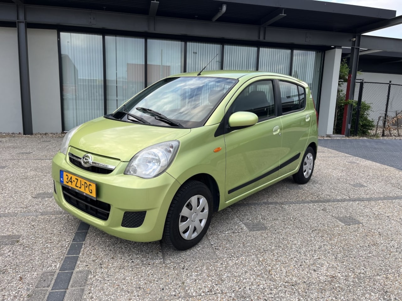 Daihatsu Cuore - 1.0 Premium 5D Elektr pakket Apk - AutoWereld.nl