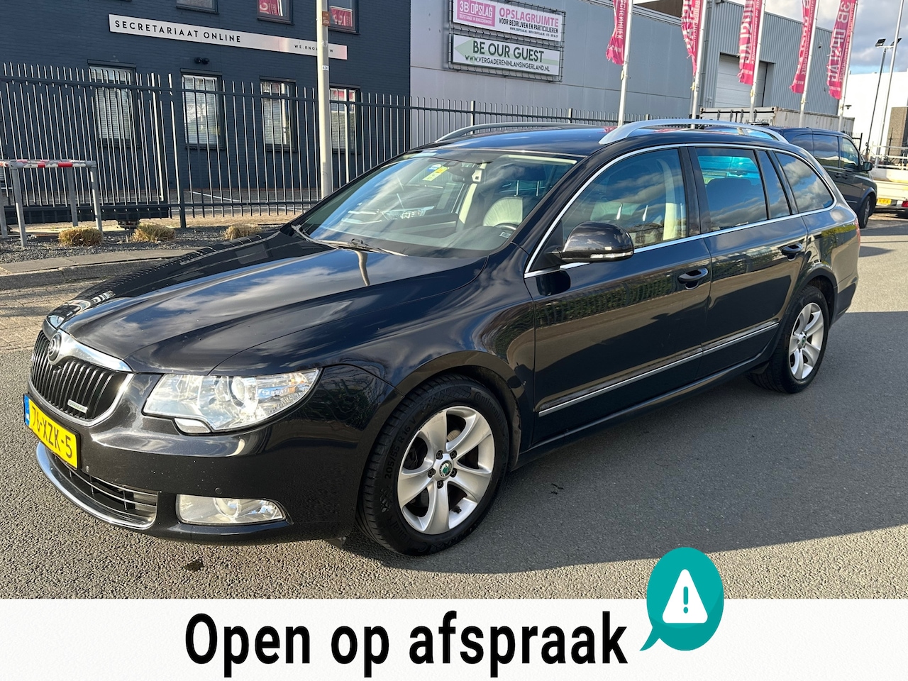 Skoda Superb Combi - 1.6 TDI Greenline Tour Business Line 2012 ZWART CLIMA XENON MEMORY NIEUWE APK - AutoWereld.nl