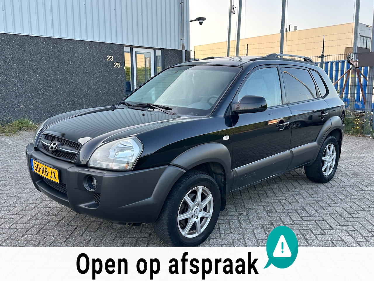 Hyundai Tucson - 2.0i Dynamic 2005 Zwart Schuifdak Airco - AutoWereld.nl