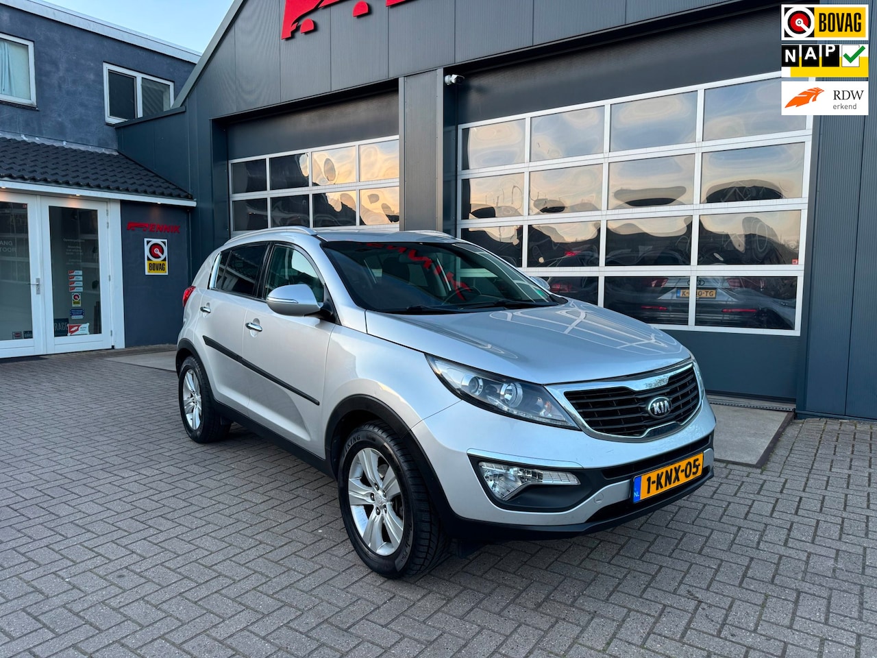 Kia Sportage - 1.6 GDI 20th Anniversary / Cruise / Clima / Trekhaak / Camera - AutoWereld.nl