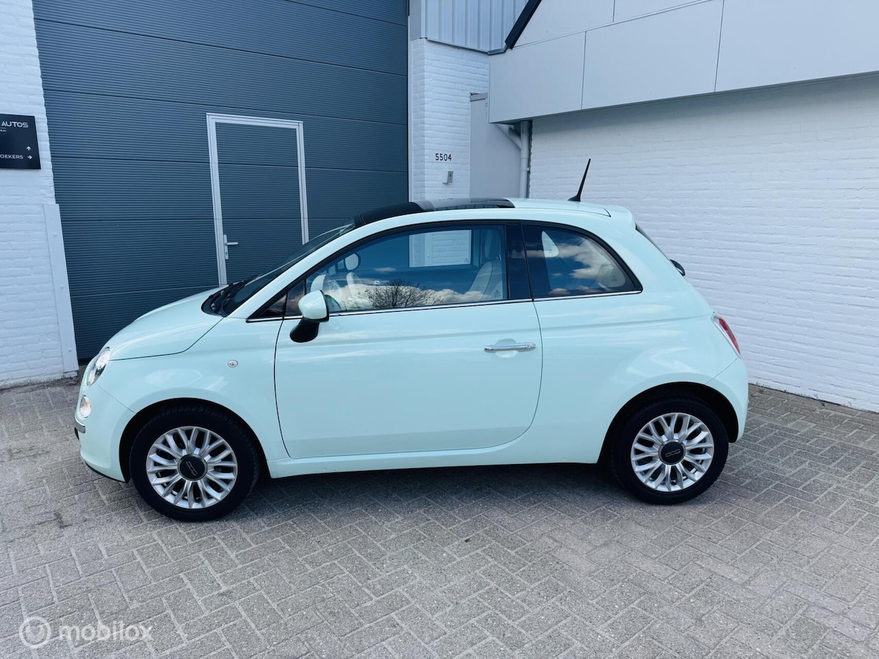 Fiat 500 - 1.2 Lounge Pano Pdc Airco Lage km - AutoWereld.nl