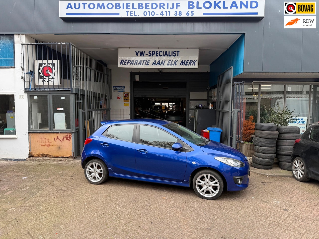 Mazda 2 - 1.5/ GT-M/ met onderhoudshistorie, Airco, Spoiler, Sideskirts en een ruime APK!!! - AutoWereld.nl