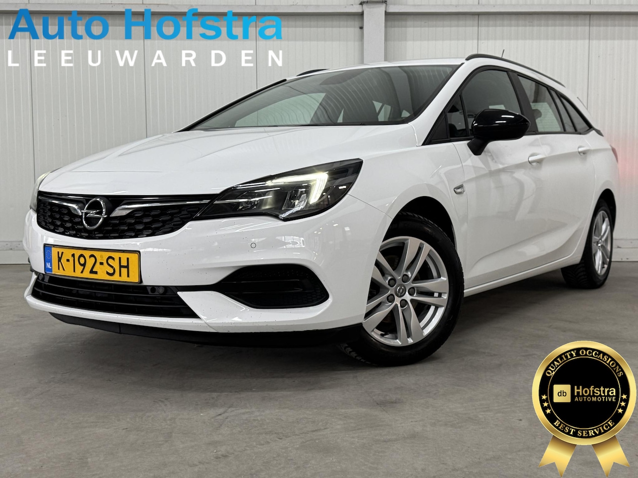 Opel Astra Sports Tourer - 1.2 Edition LED NAVI CARPLAY 2XPDC LMV TREKHAAK - AutoWereld.nl