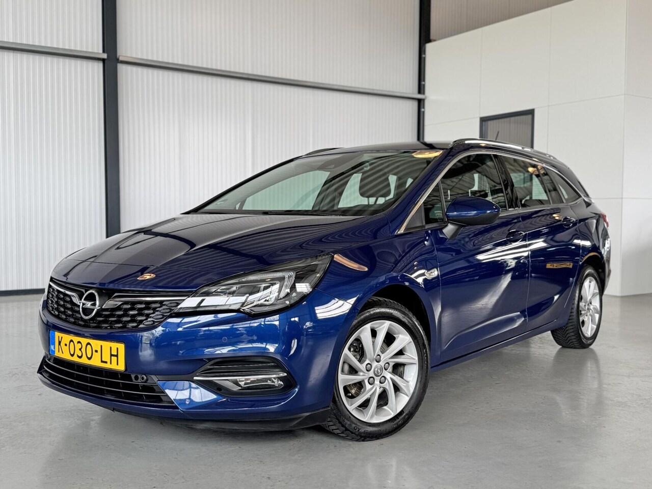 Opel Astra Sports Tourer - 1.2 Turbo 107kW Business Edition Executive - AutoWereld.nl
