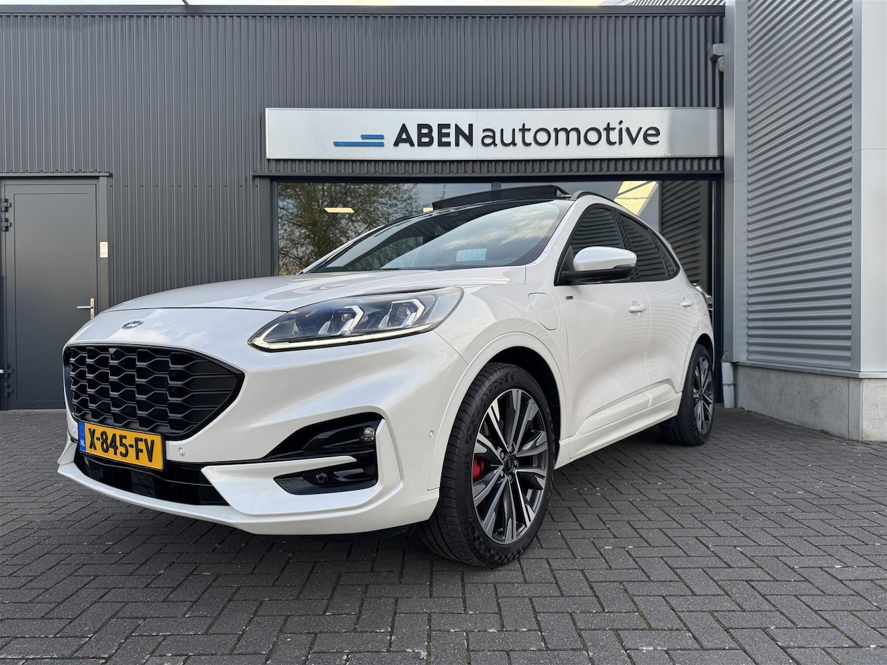 Ford Kuga - 2.5 Hybrid PHEV 225PK ST-Line X (PANO|20"|ELEK. HLEP|HUD|WINTER PACK) - AutoWereld.nl