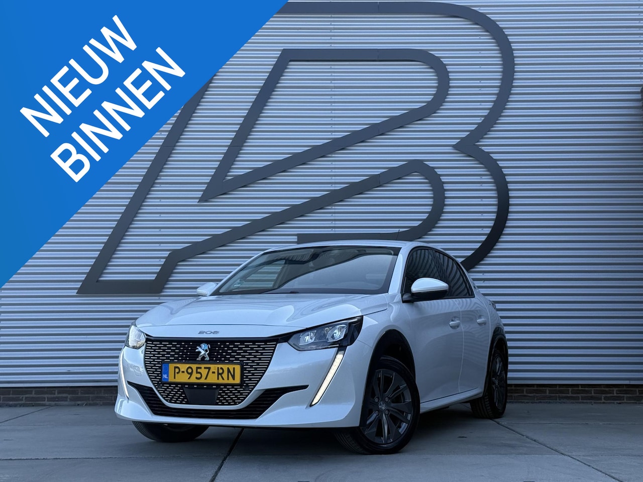 Peugeot e-208 - EV Allure Pack 50 kWh 2e Eigenaar|Navi|Carplay|Camera|Clima|Cruise|PDC|Dealer Onderhouden| - AutoWereld.nl