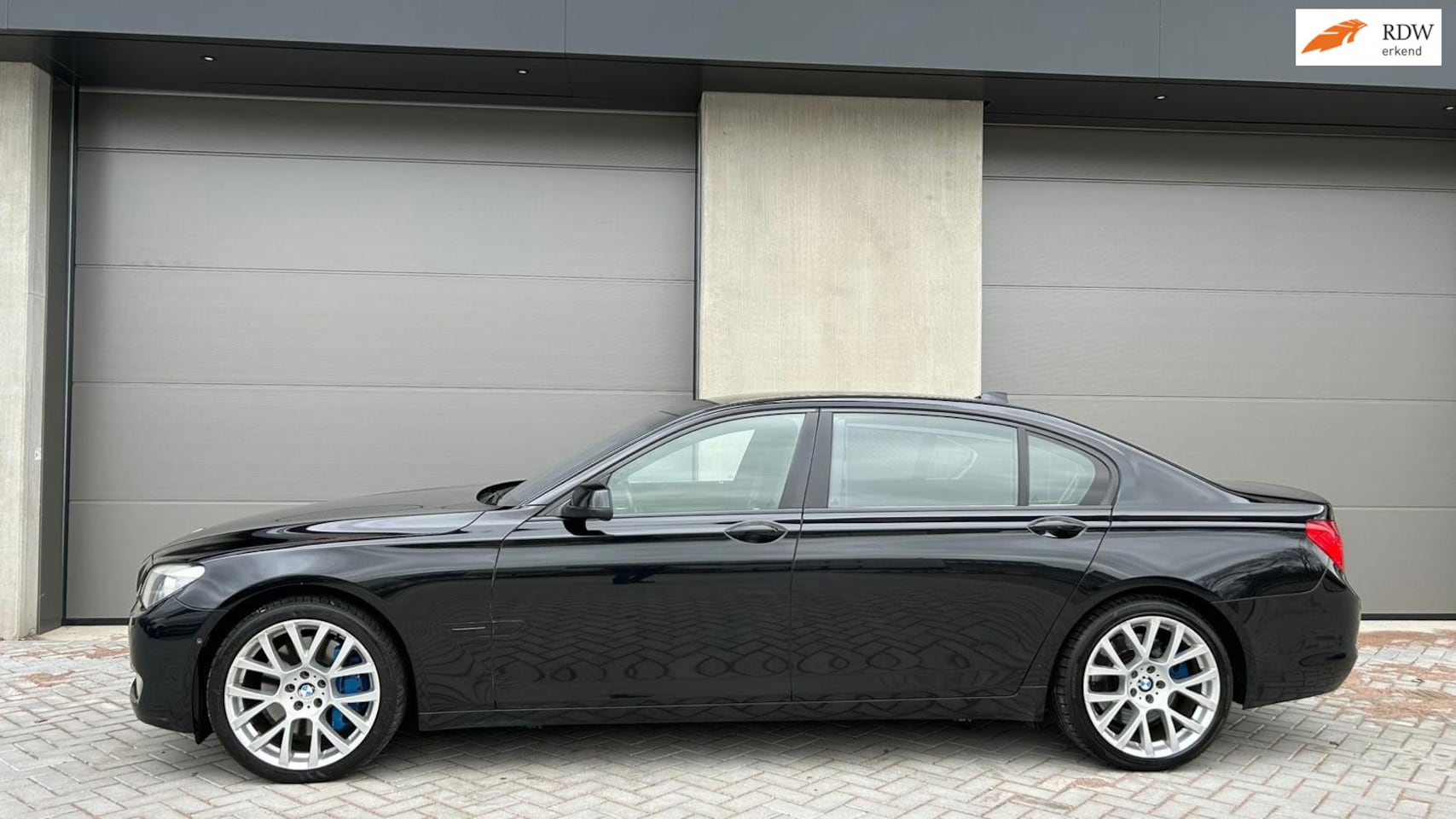 BMW 7-serie - 750Li 2009 YOUNGTIMER/BOMVOL/VERSTELBARE ACHTERBANK/ZEER MOOI/RIJDT EN SCHAKELT PERFECT/IN - AutoWereld.nl