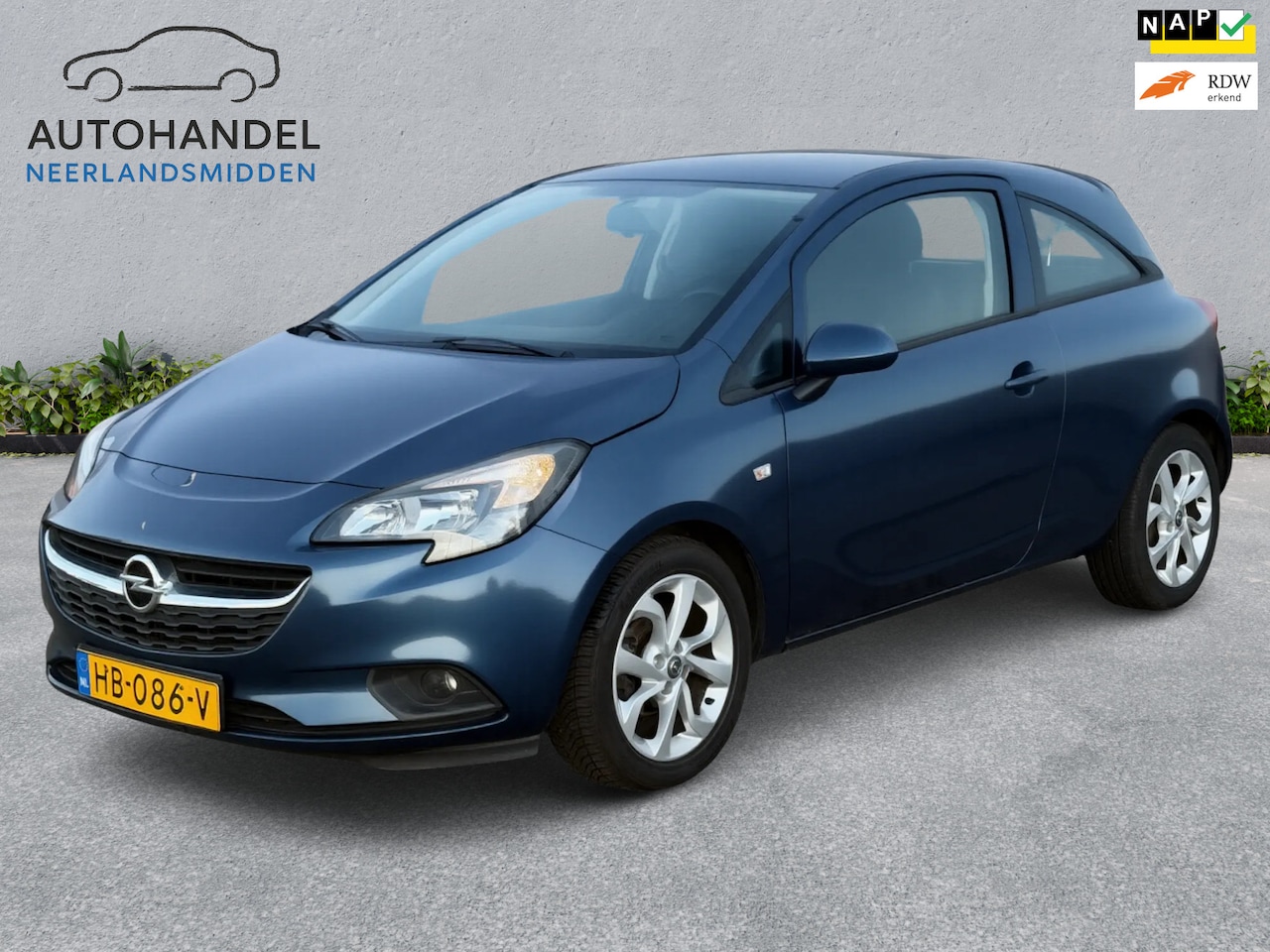Opel Corsa - 1.4 Edition airco cruise control - AutoWereld.nl