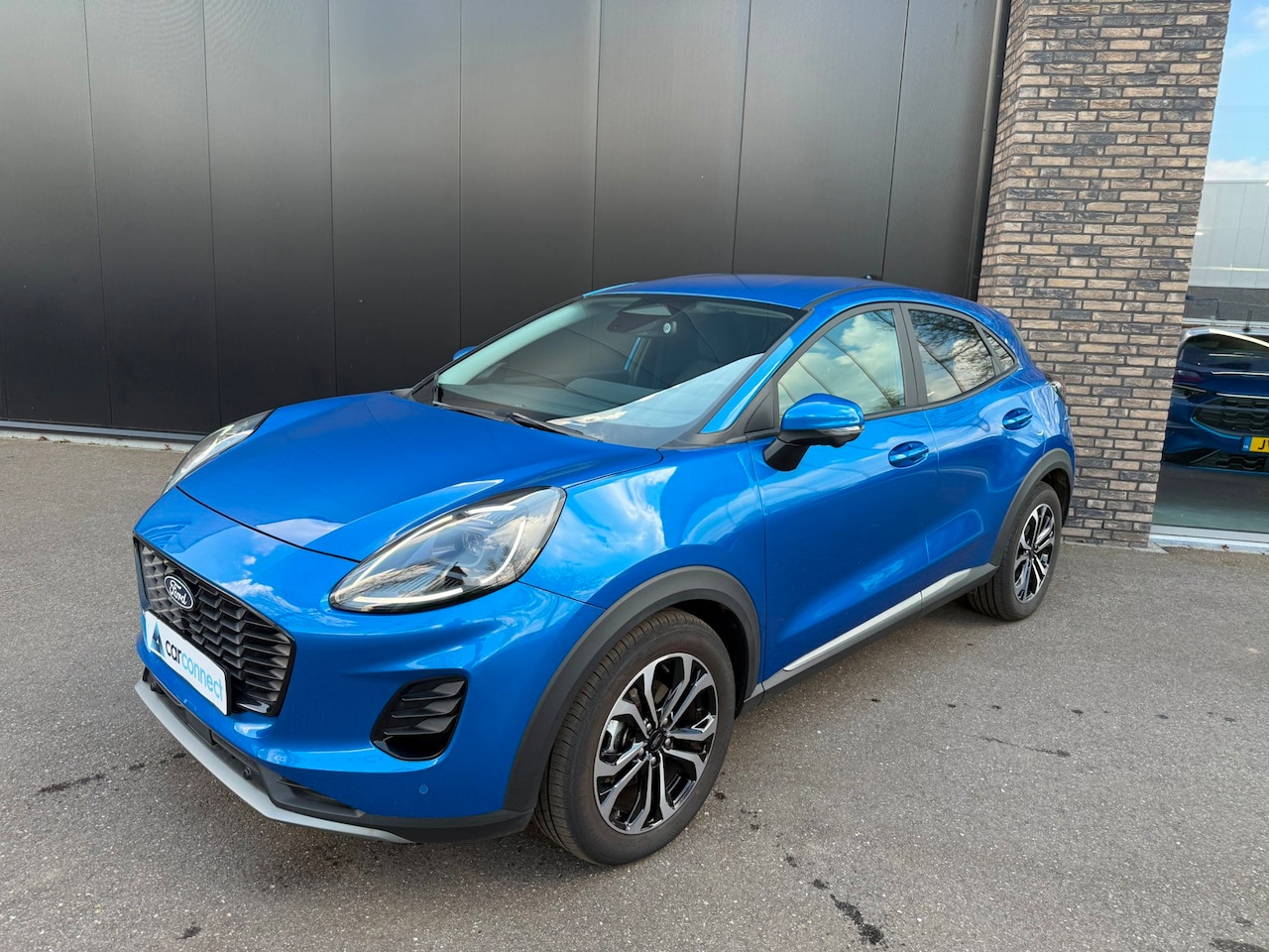 Ford Puma - 1.0 Eco 125pk AUT. Hybrid Titanium Navi, Trekhaak, Winter pack, 360 gr camera, BLIS etc. e - AutoWereld.nl