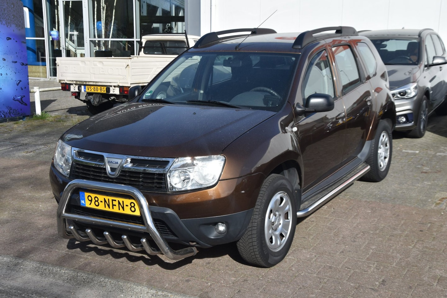 Dacia Duster - 1.6 Lauréate 2wd Airco Elek. Ramen Trekhaak NAP - AutoWereld.nl