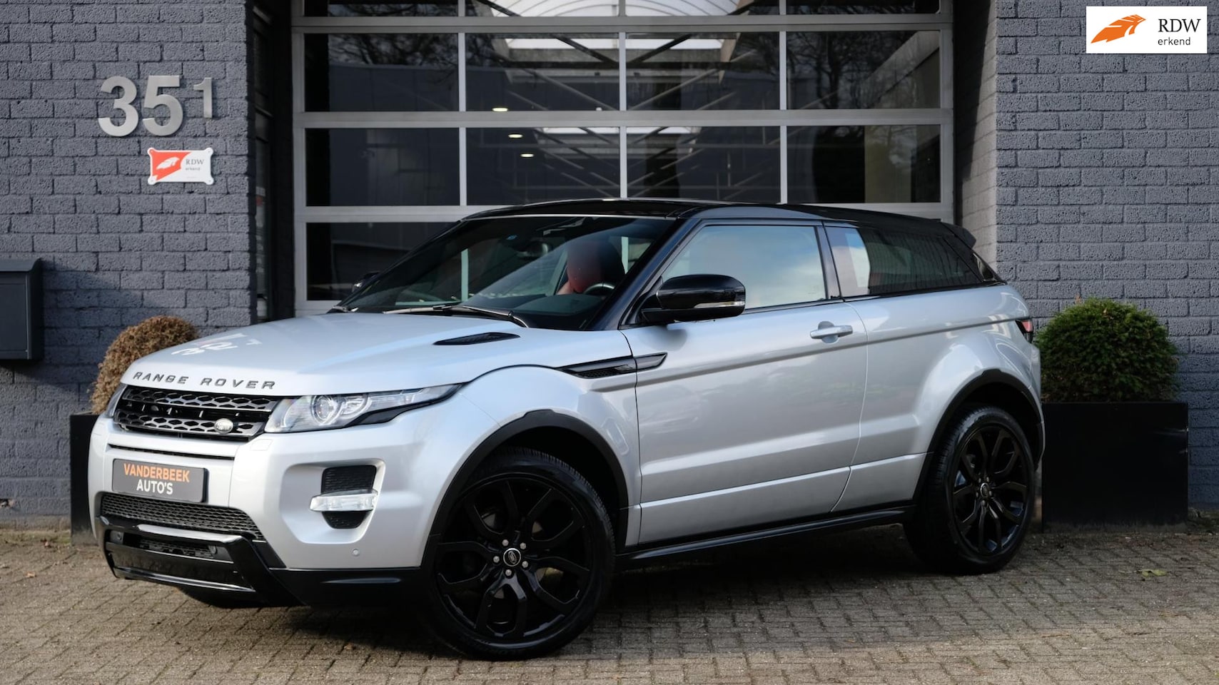 Land Rover Range Rover Evoque Coupé - 2.0 Si 4WD Prestige Dynamic Panorama - AutoWereld.nl