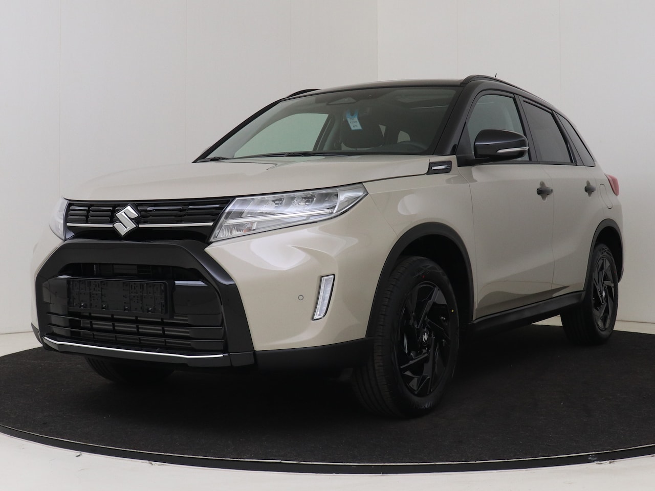Suzuki Vitara - 1.4 Boosterjet Smart Hybrid 60th Special Edition | Apple Carplay & Android Auto |  Leder | - AutoWereld.nl