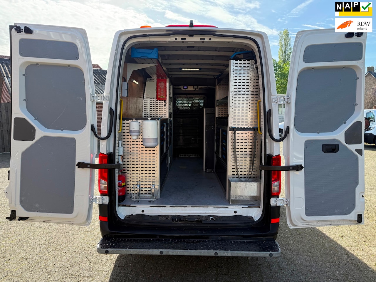 Volkswagen Crafter - 35 2.0 TDI L3H3 Servicebus Sortimo 230V 140PK Camera Navi - AutoWereld.nl