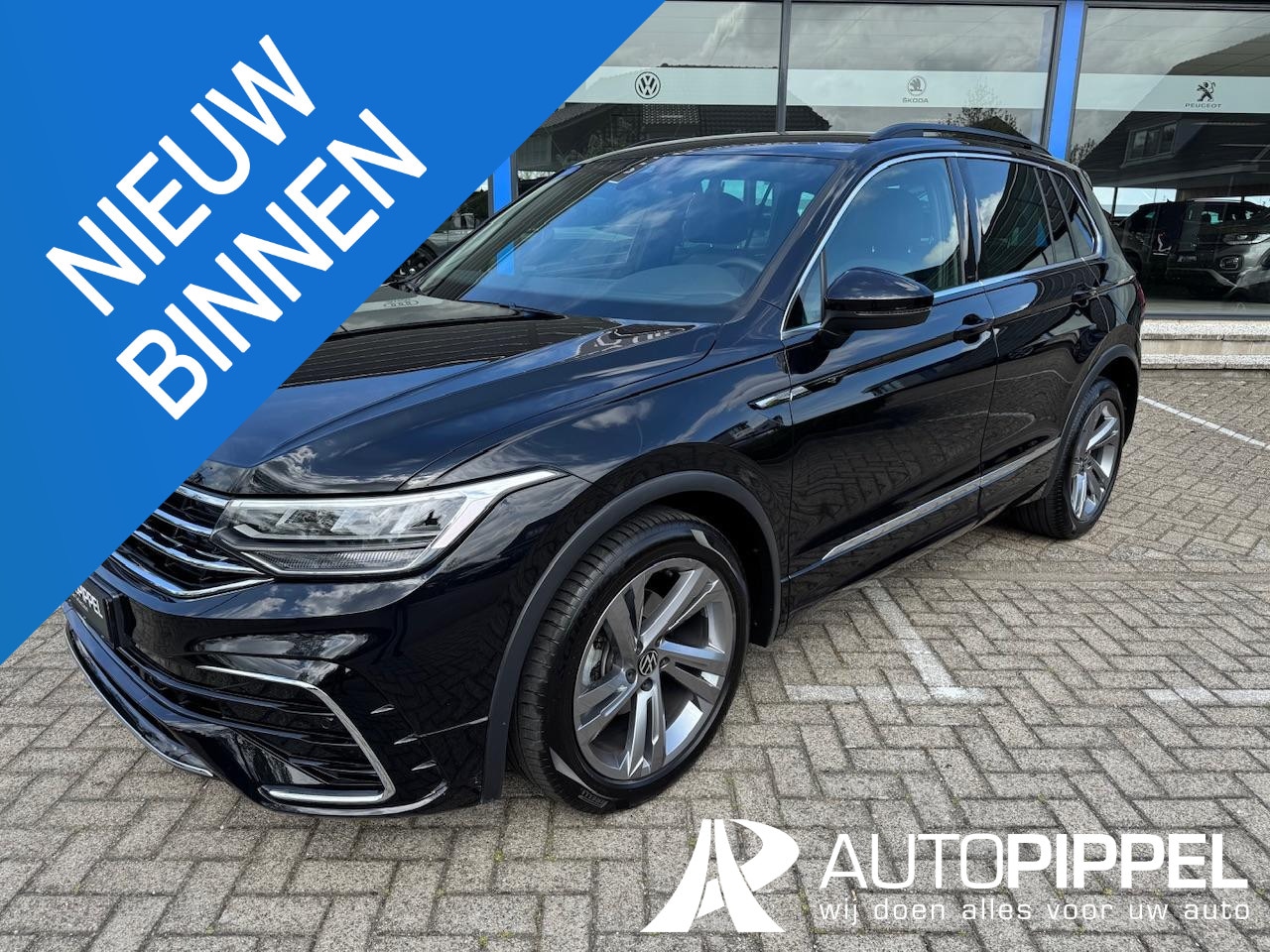Volkswagen Tiguan - 1.5 TSI R-Line | Led | 19"LMV | AURcamera | ACC | 1e eig. | als nieuw! - AutoWereld.nl