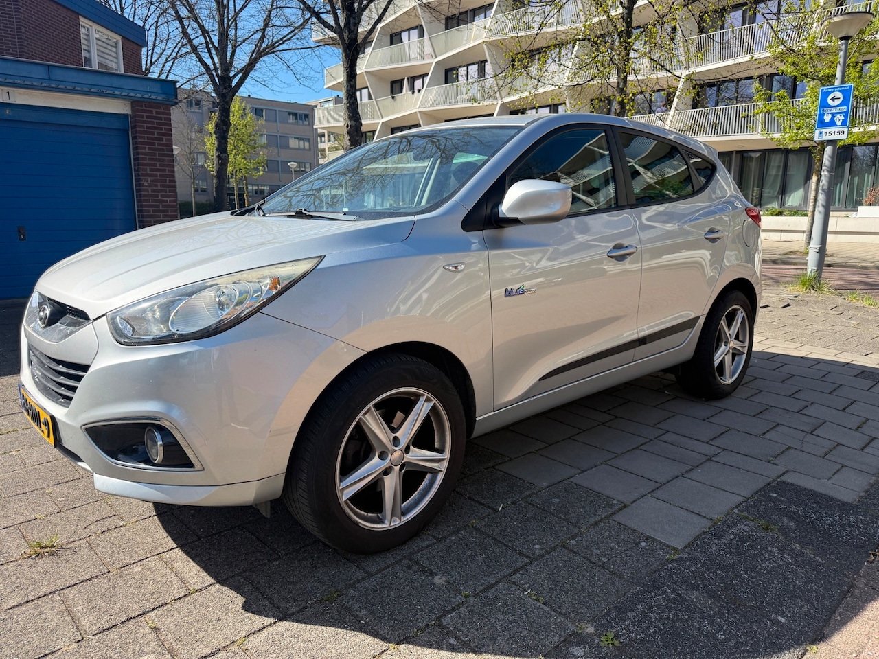 Hyundai ix35 - 1.6i GDI Dynamic Climate Cruise PDC - AutoWereld.nl