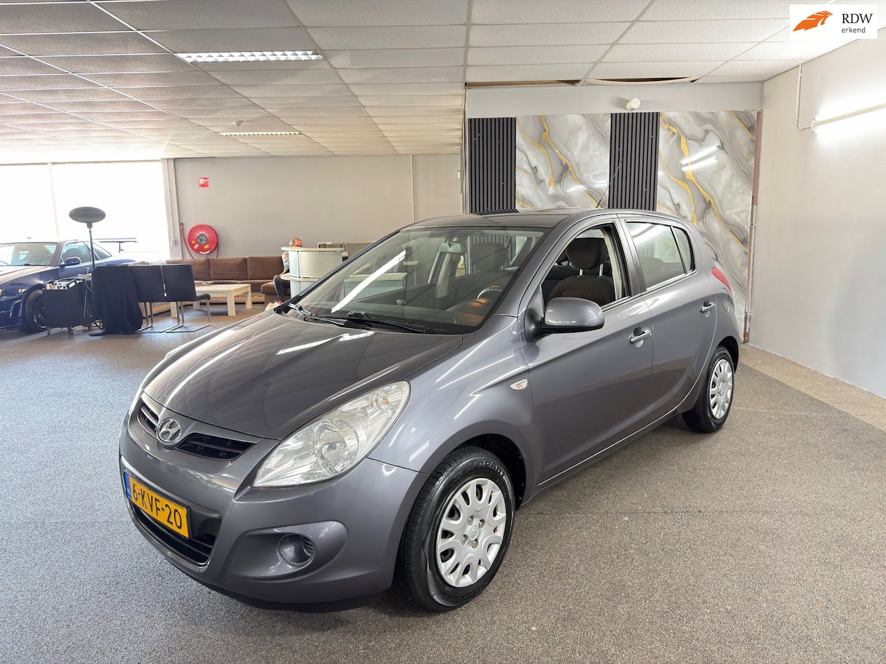 Hyundai i20 - 1.2i i-Drive Apk Nieuw,Airco,Bluetooth,Trekhaak,Aux,N.A.P,2 sleutels+Boekjes,Topstaat!! - AutoWereld.nl