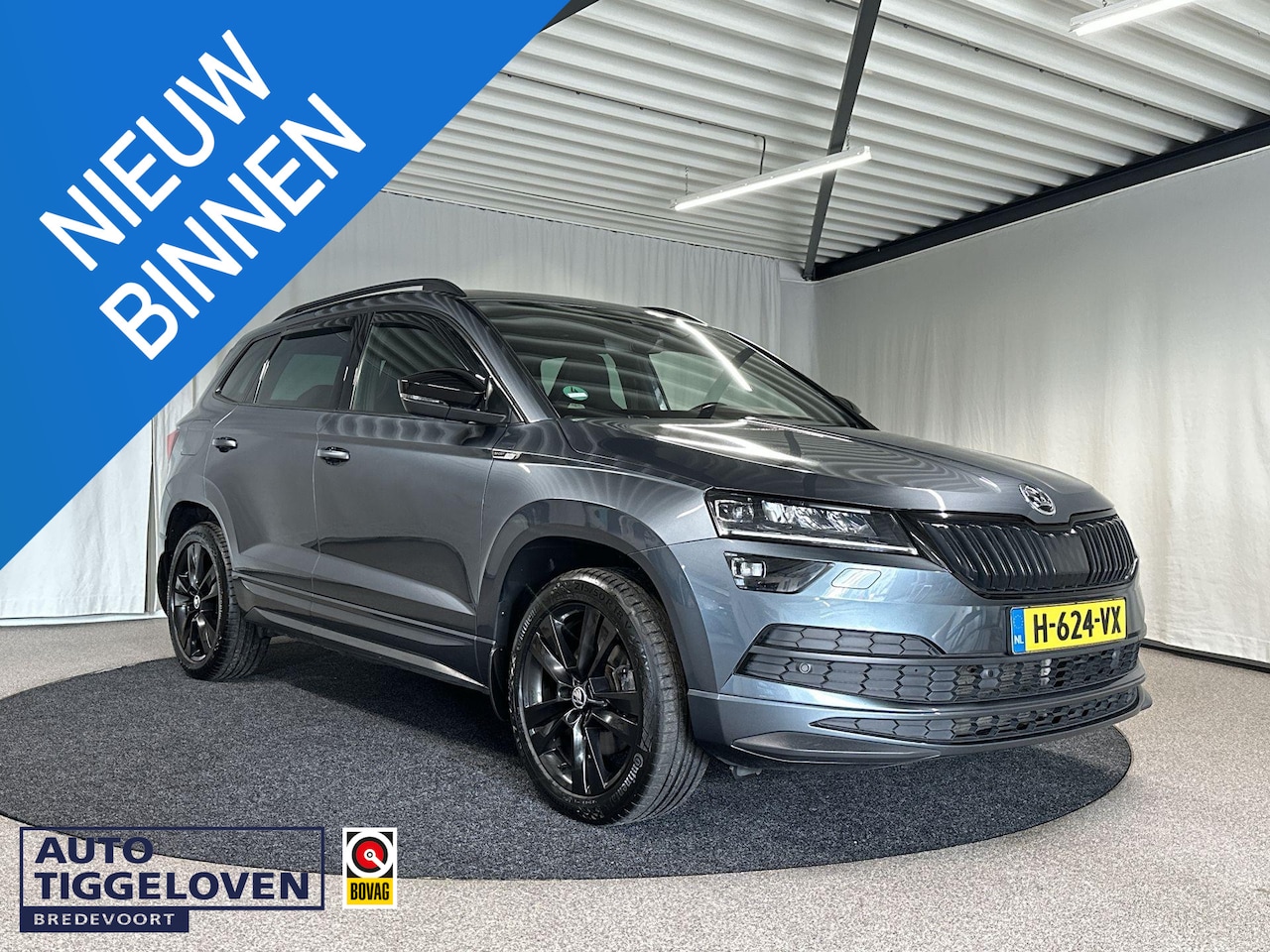 Skoda Karoq - 1.5 TSI ACT Sportline Business Automaat | Trekhaak | Pano - AutoWereld.nl