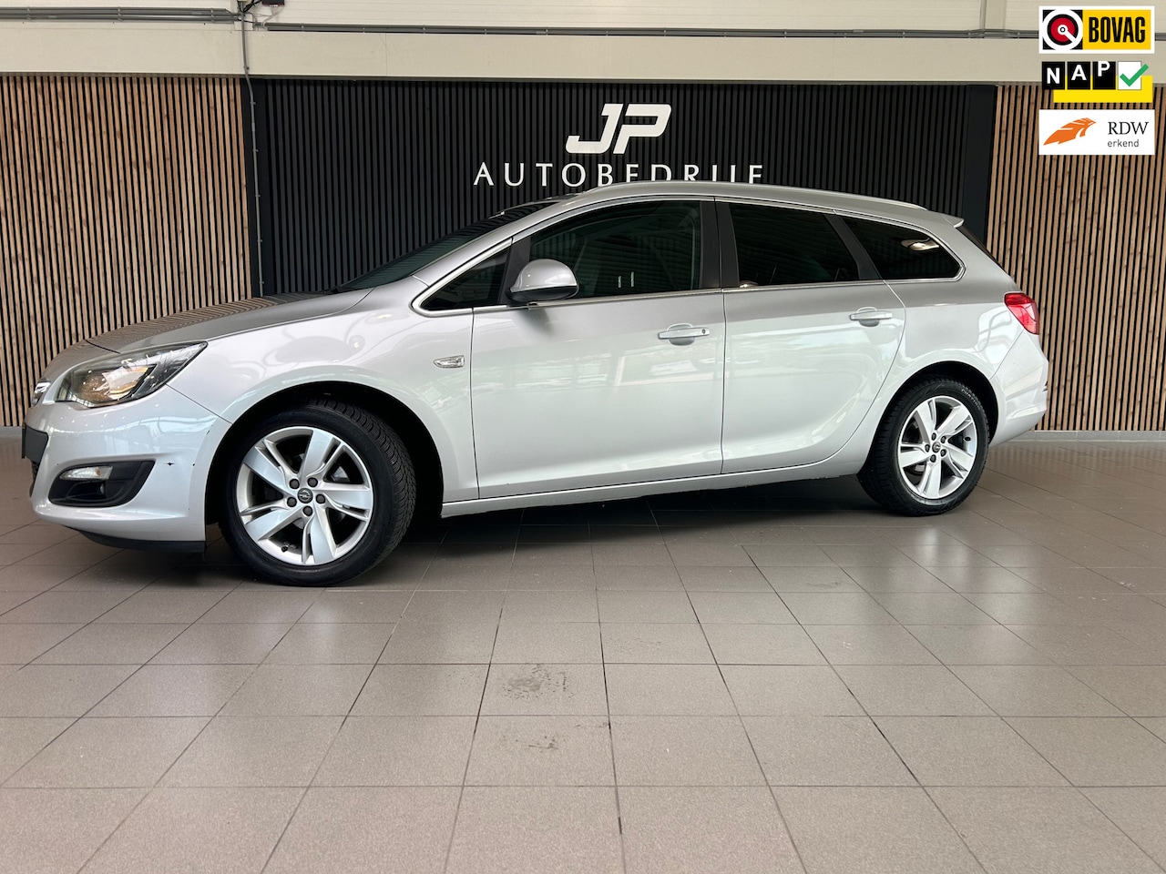 Opel Astra Sports Tourer - 1.4 Turbo Business + CRUISE|NAVI|PDC|17" LM VELGEN| - AutoWereld.nl