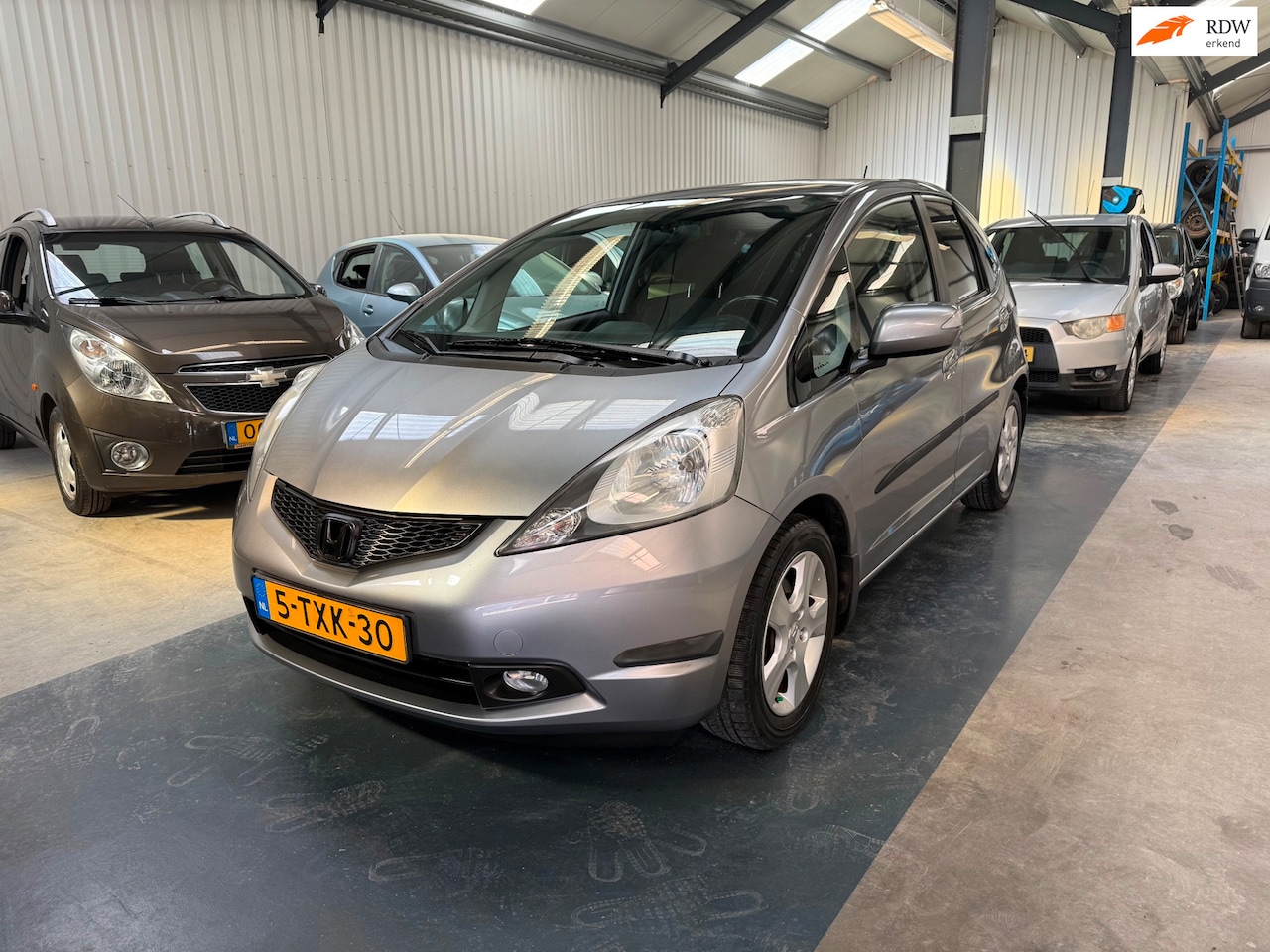 Honda Jazz - 1.4 Elegance Clima/Nap/Apk - AutoWereld.nl