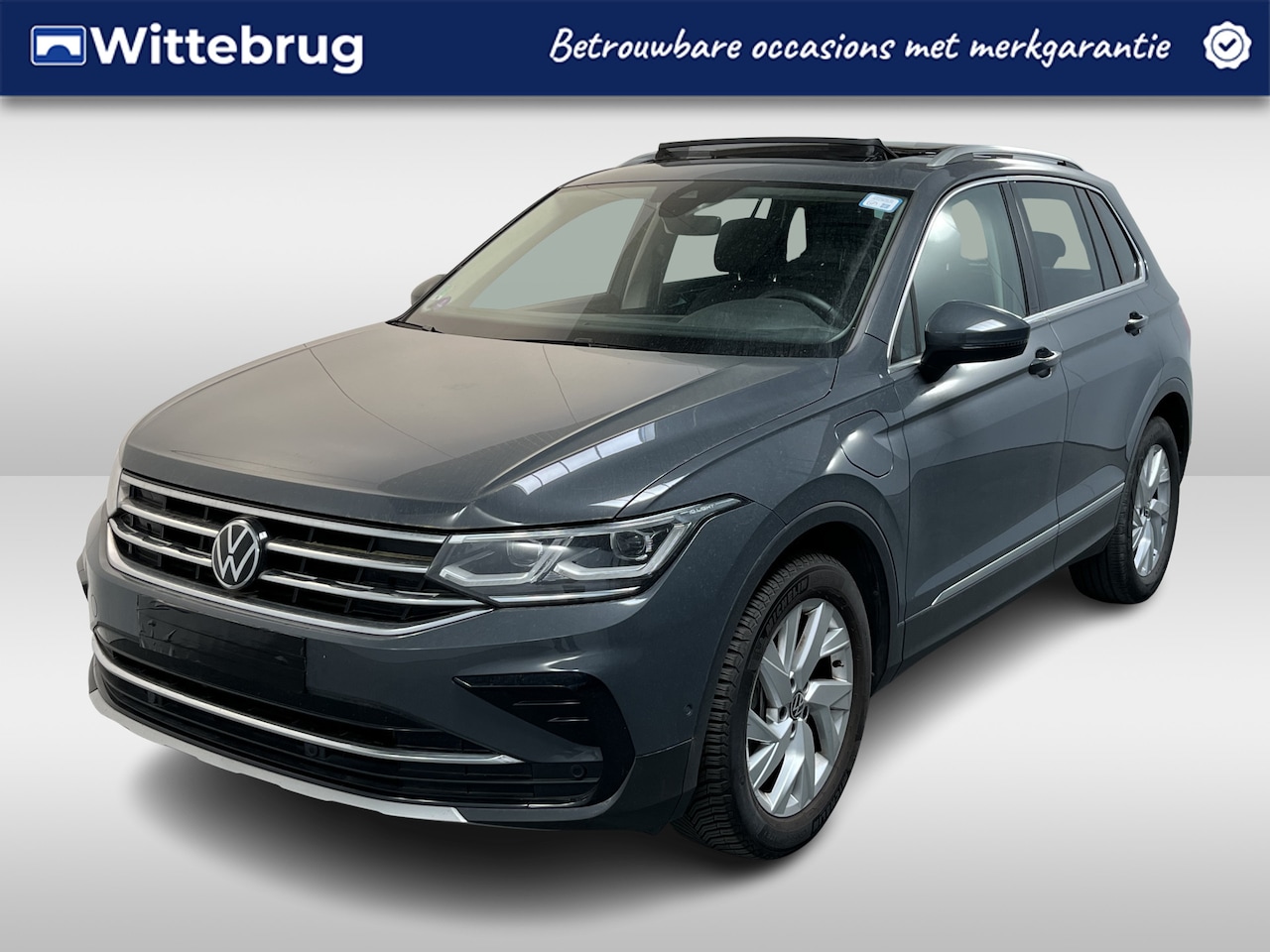 Volkswagen Tiguan - 1.4 TSI eHybrid Elegance / AUTOMAAT/ 245PK/ PANO/ TREKHAAK/ PARK.SENSOR.V+A/ CAMERA/ ELEK. - AutoWereld.nl