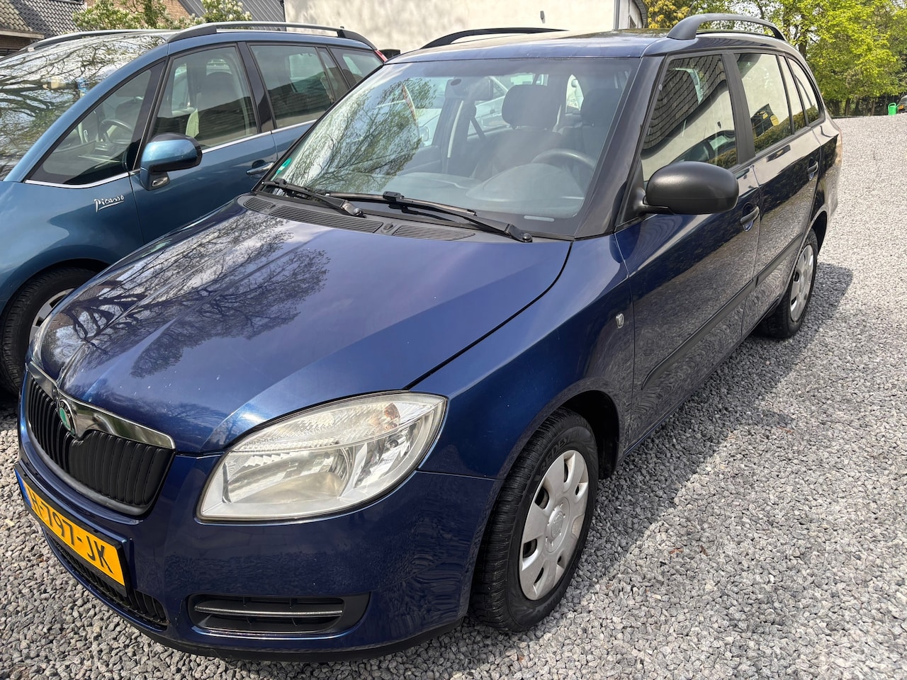 Skoda Fabia Combi - 1.2-12V Go KM 142000 MET NAP - AutoWereld.nl