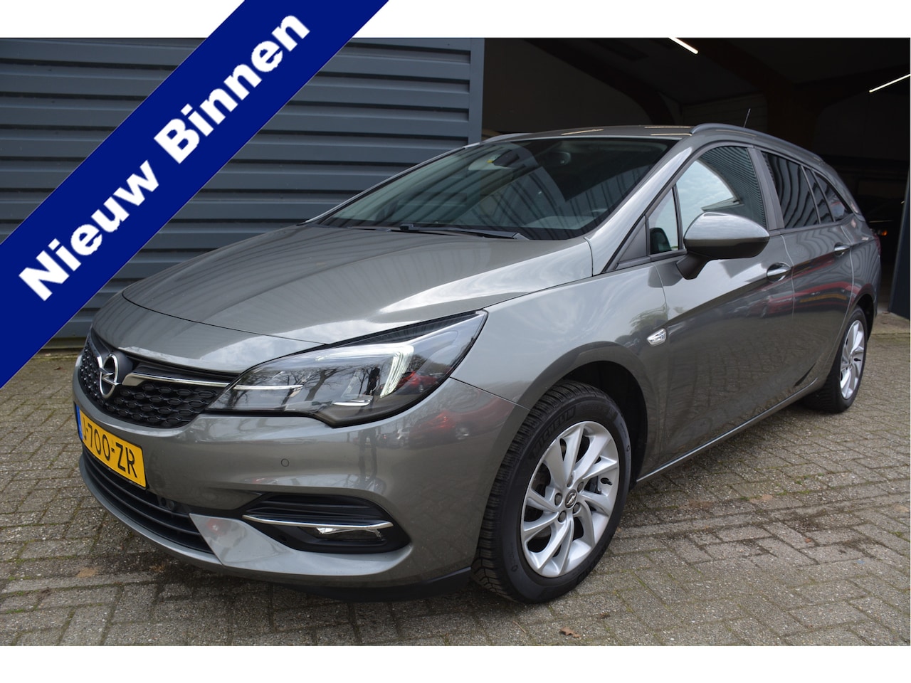 Opel Astra Sports Tourer - 1.2 Business Executive Led Navigatie Stoel verw Stuur verw - AutoWereld.nl