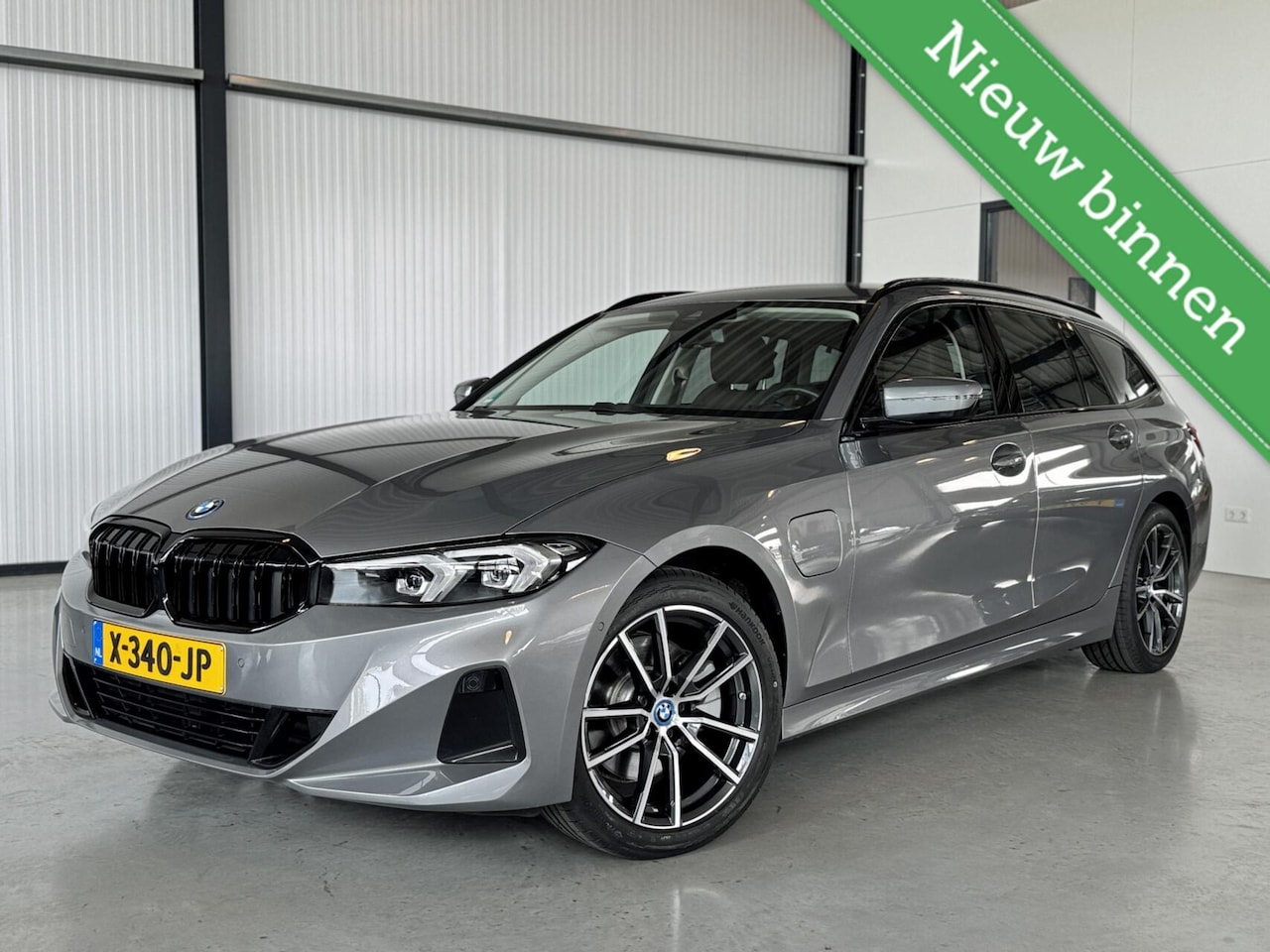 BMW 3-serie Touring - 320e 150kW PHEV Touring - AutoWereld.nl
