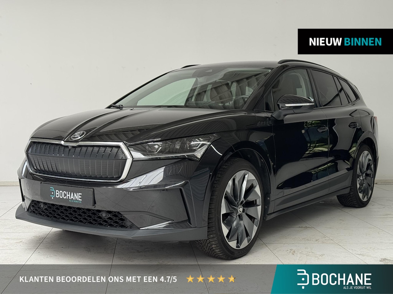 Skoda Enyaq iV - 60 First Edition | Navigatie | PDC | SOH 93,2% | Stoelverwarming | Adaptive Cruise Control - AutoWereld.nl