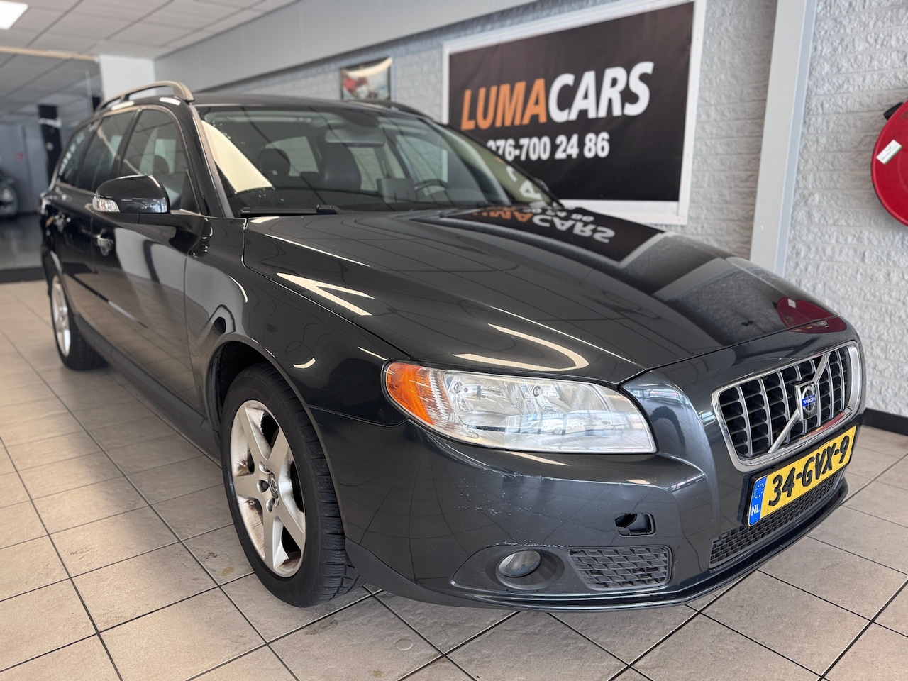 Volvo V70 - 2.0 Momentum | Airco |Leder|146 pk | vol opties | - AutoWereld.nl