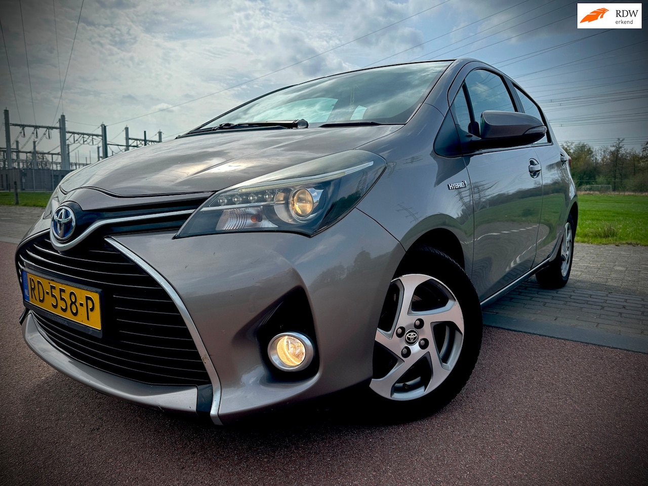 Toyota Yaris - 1.5 Hybrid Aspiration 1.5 Hybrid Aspiration, AUTOMAAT, NIEUWSTAAT, ZUINIG, APK - AutoWereld.nl