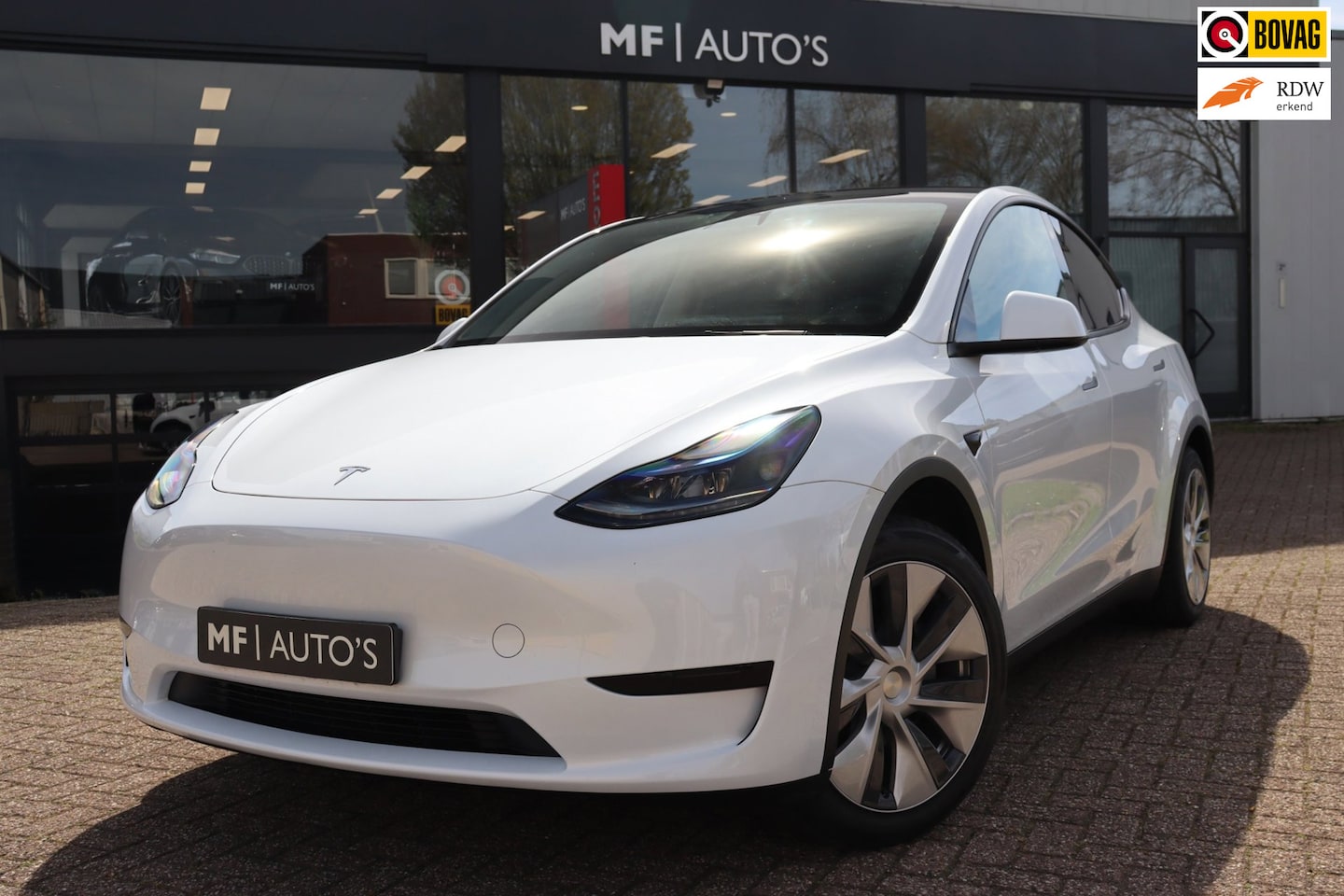 Tesla Model Y - RWD 58 kWh Autopilot|Pano|ACC| - AutoWereld.nl