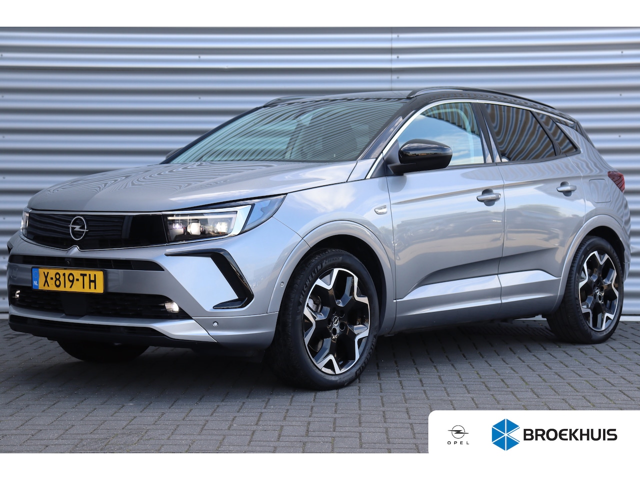 Opel Grandland - 1.6 TURBO HYBRID 225PK ULTIMATE AUTOMAAT / NAVI / LEDER / CLIMA / LED / PDC / AGR / 18" LM - AutoWereld.nl