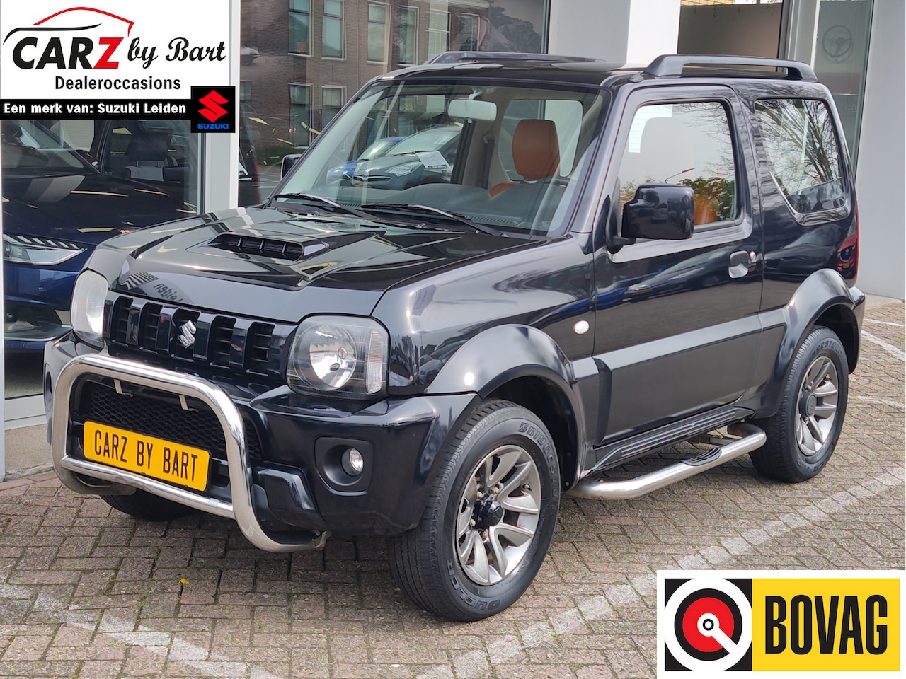 Suzuki Jimny - 1.3 EXCLUSIVE AUTOMAAT Cognac leder | Airco | 4x4 | USB - AutoWereld.nl