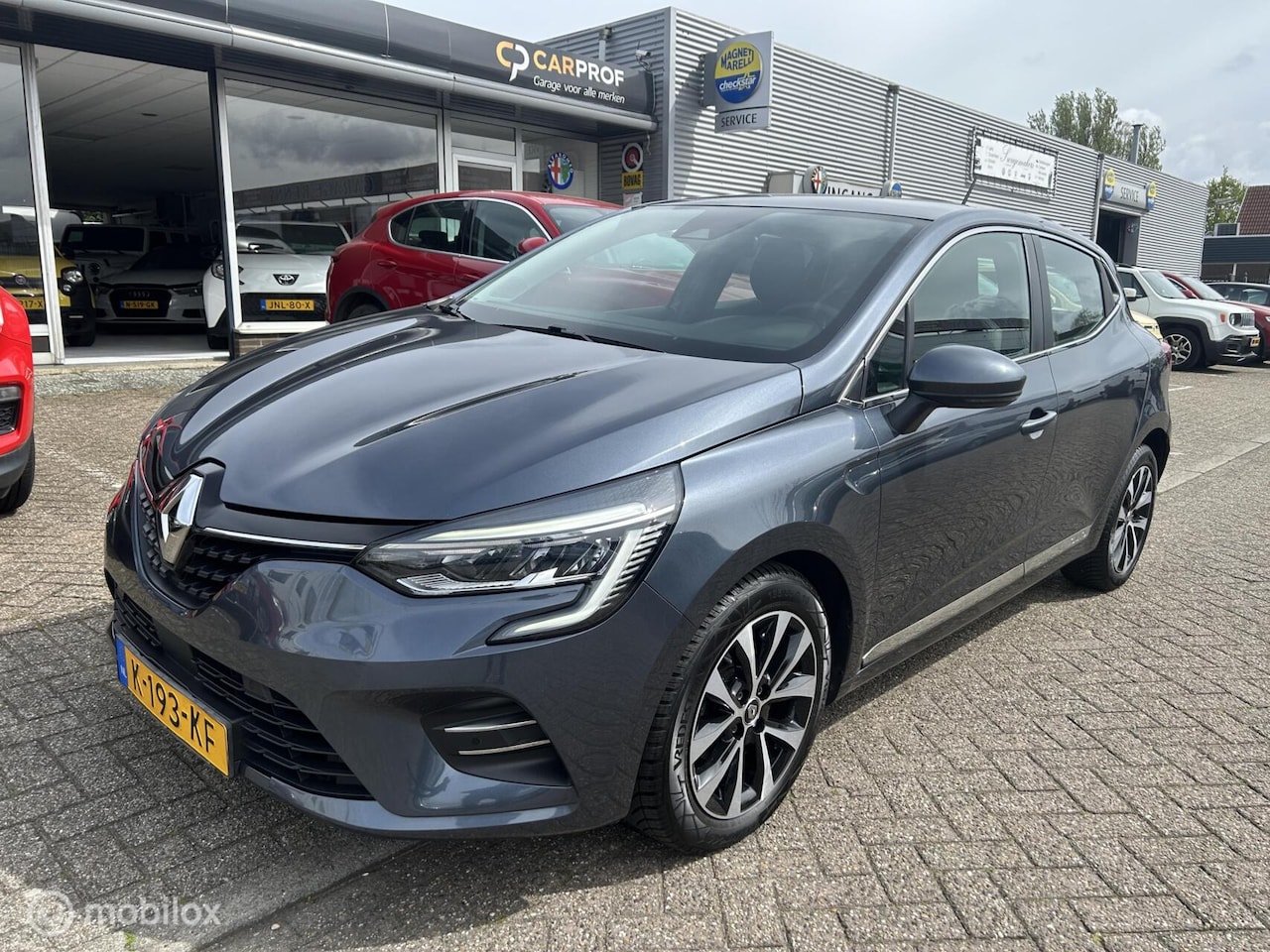 Renault Clio - 1.0 TCe Intens Navi Camera Carplay - AutoWereld.nl