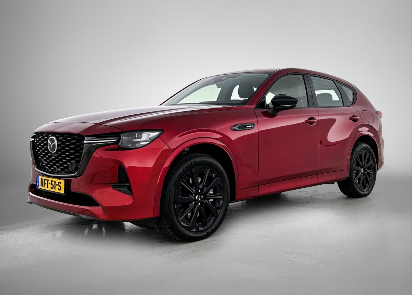 Mazda CX-60 - 2.5 e-SkyActiv PHEV Homura met DA pakket en trekhaak - AutoWereld.nl
