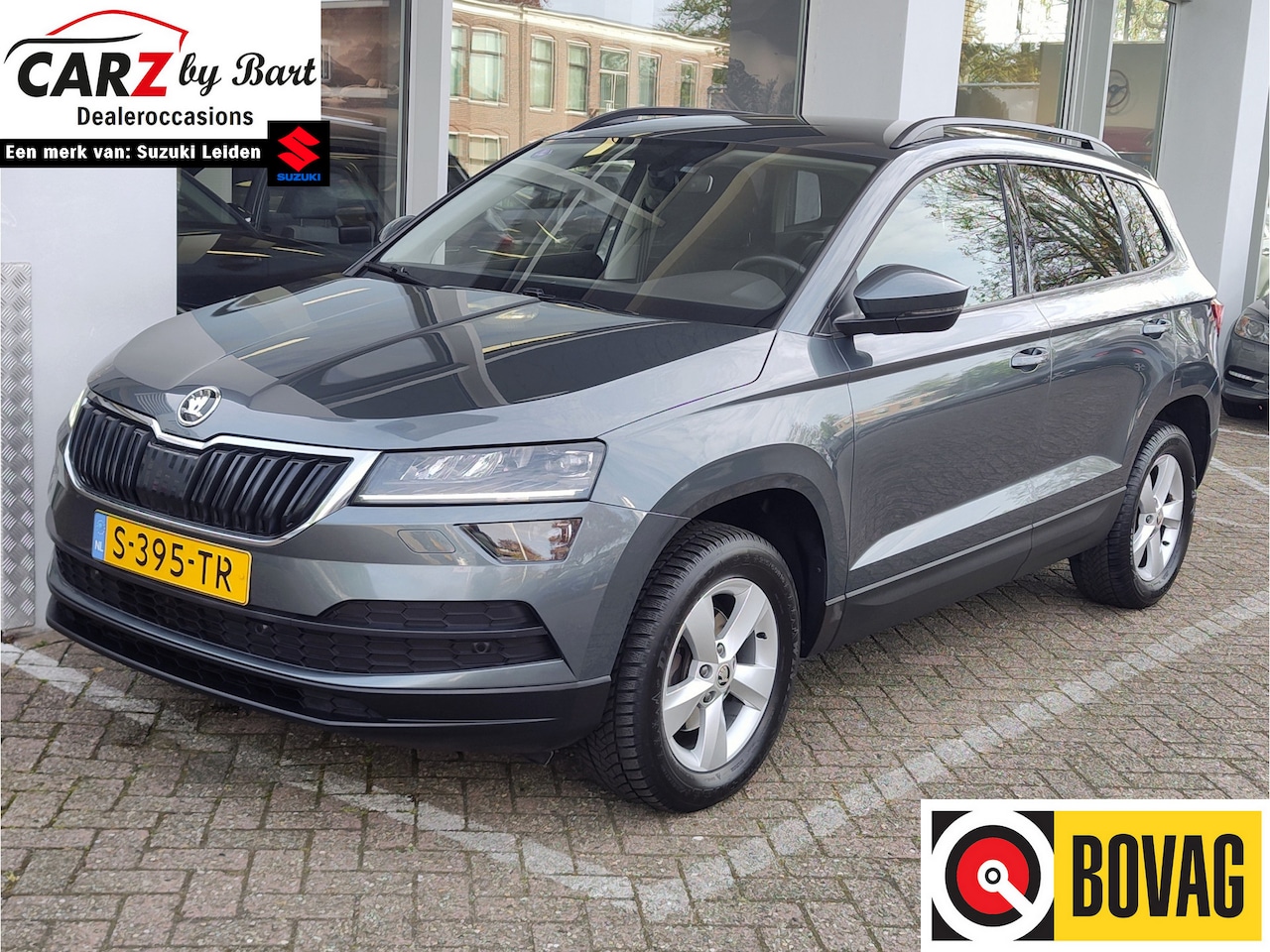 Skoda Karoq - 1.0 TSI AMBITION BUSINESS DSG Navi | Clima | Cruise | Parkeersensoren V+A - AutoWereld.nl