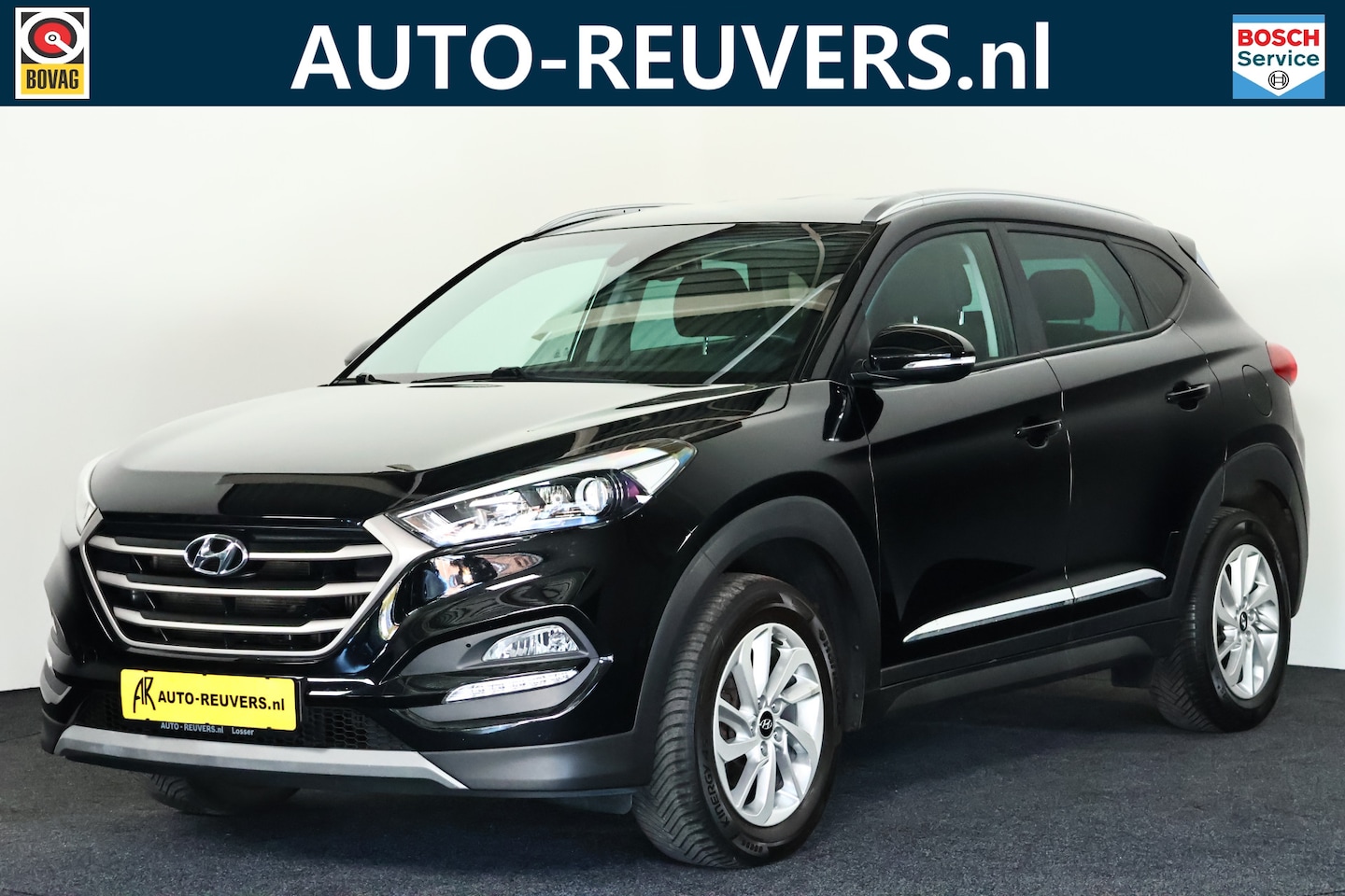 Hyundai Tucson - 1.6 T-GDi 4WD Comfort / Navi / Cruisecontrol / Clima / Camera - AutoWereld.nl