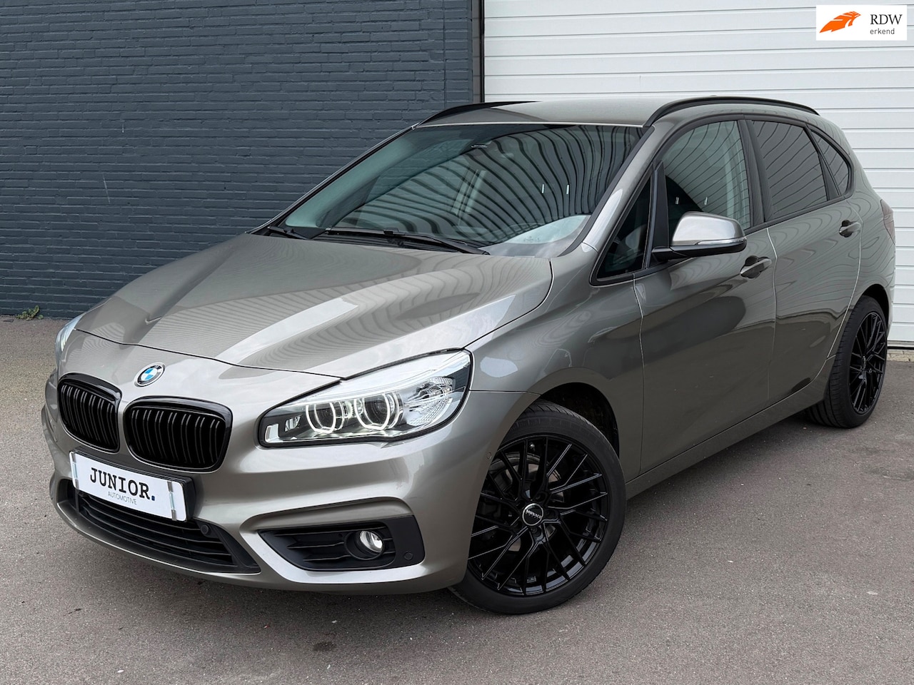 BMW 2-serie Active Tourer - 216i High Executive LEDER/CRUISE/CLIMA/STOELVERWARMING - AutoWereld.nl